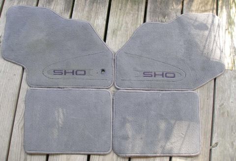 1997 Ford Taurus - These "SHO" branded floor mats are for sale, but do not appear to be from a 1997 Ford Taurus.
