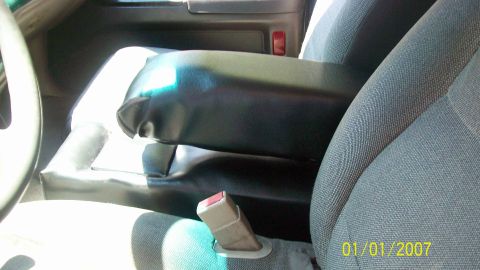 2004 Ford Crown Victoria - Interior view of a car showing the center console and seats.
