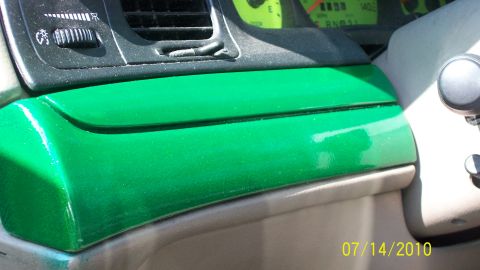 2004 Ford Crown Victoria - Custom green painted dashboard trim on a 2004 Ford Crown Victoria interior. Instrument cluster is visible.