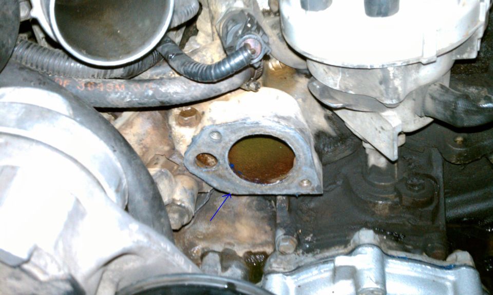 Engine part with gasket removed, showing internal components