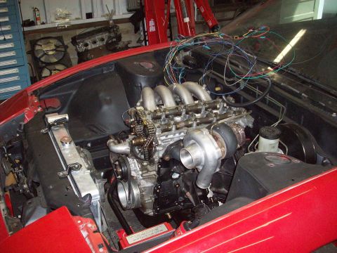 1992 Nissan 240SX - The engine bay shows a turbocharger and extensive wiring, suggesting a modified vehicle.