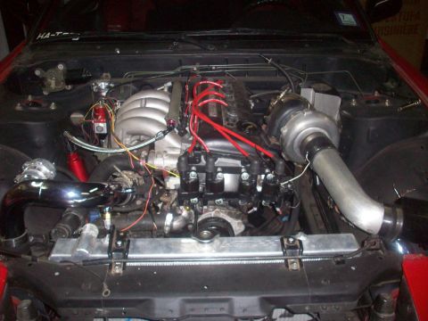 1992 Nissan 240SX - Custom turbocharged engine bay with prominent aftermarket parts installed.