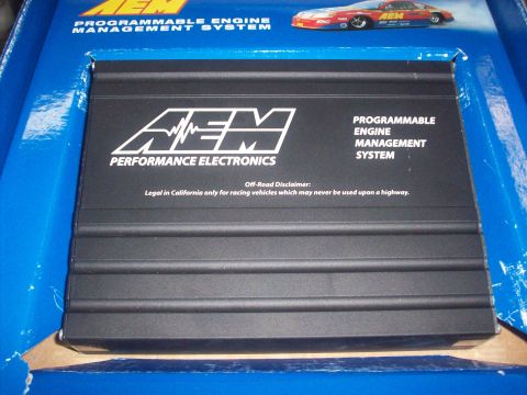 1992 Nissan 240SX - AEM programmable engine management system box, labeled "Off-Road Disclaimer: Legal in California only for racing vehicles which may never b…