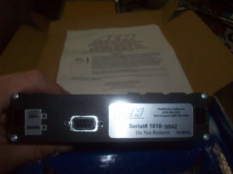 1992 Nissan 240SX - Close-up of an AEM engine management unit, showing serial number and contact information.
