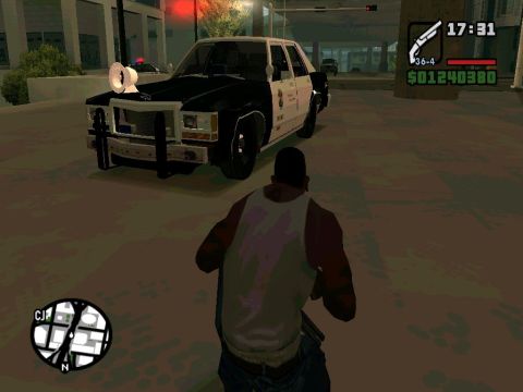 2000 Mercury Grand Marquis - This is a police car with a push bar and spotlight.