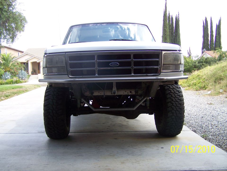 1995 Ford Bronco front end with aftermarket bumper and large tires