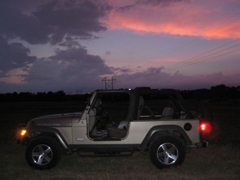 2005 Jeep Wrangler - 2005 Jeep Wrangler Rubicon parked outdoors during a colorful sunset.