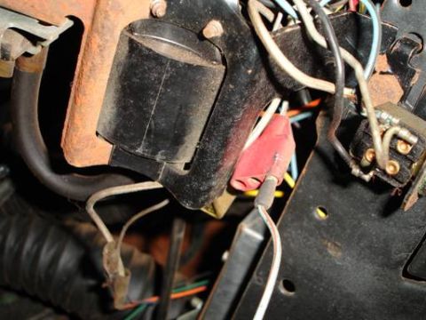 1968 Shelby GT500 - Detail of automotive wiring and electrical connections, showing a red connector and various wires.