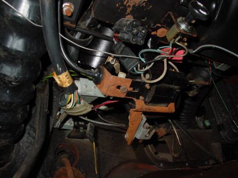 1968 Shelby GT500 - Close-up view of the steering column wiring harness and associated switches, with a visible BPO label.