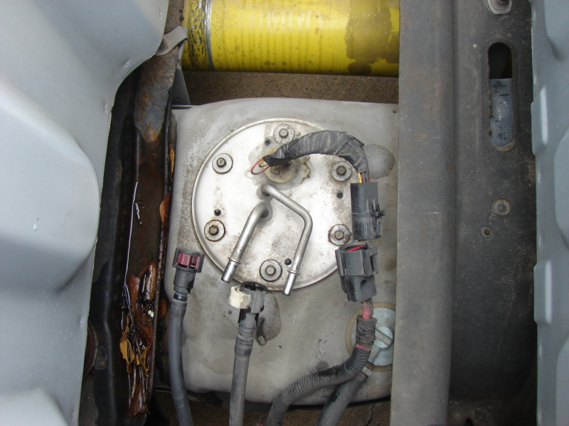 Fuel pump assembly with electrical connectors and fuel lines