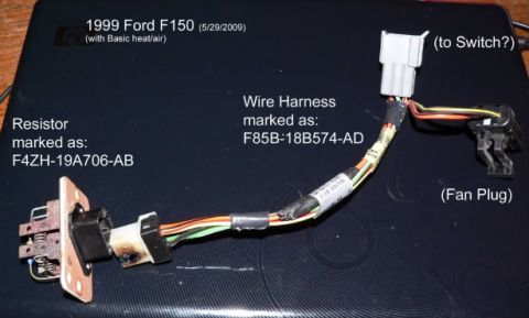 2007 Ford Mustang - Photo of a 1999 Ford F-150 (basic heat/air) blower-motor resistor F4ZH-19A706-AB and its wire harness F85B-18B574-AD, showing the fan plug…