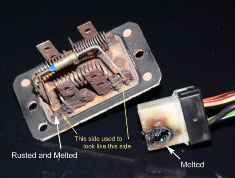 2007 Ford Mustang - A damaged blower motor resistor and its melted connector, indicating a potential electrical issue.