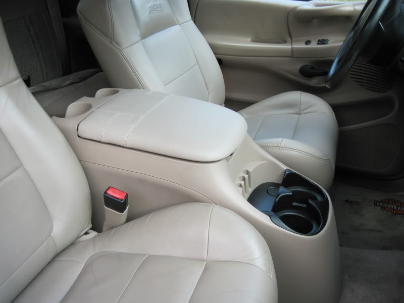 Tan leather interior with center console and cup holders