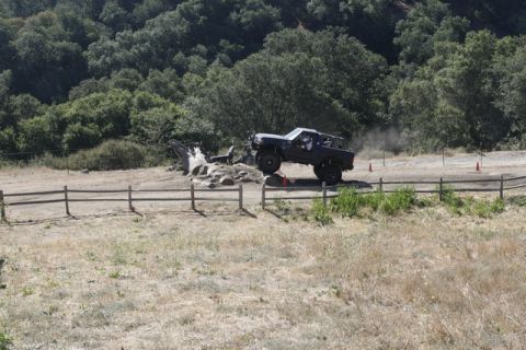 1989 Ford Bronco - This 1989 Ford Bronco is tackling a challenging obstacle on an off-road trail.