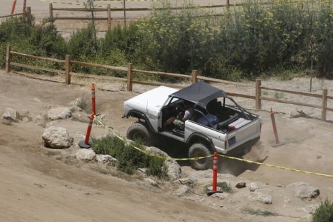 1989 Ford Bronco - This 1989 Ford Bronco navigates a rocky off-road course, demonstrating its capabilities.