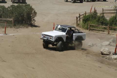 1989 Ford Bronco - This classic Ford Bronco is navigating a challenging off-road course.