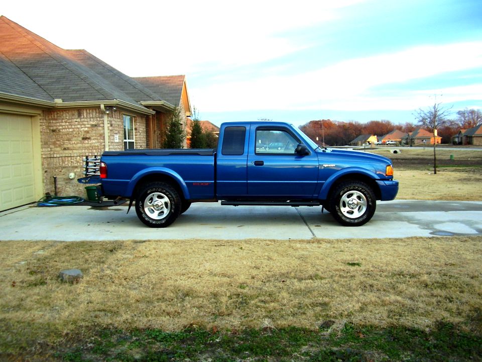 Blue 2001 Ford Ranger pickup truck parked in driveway