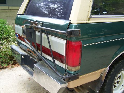 1989 Ford Bronco - Rear view of a 1989 Ford Bronco showing the bumper and spare tire mount.