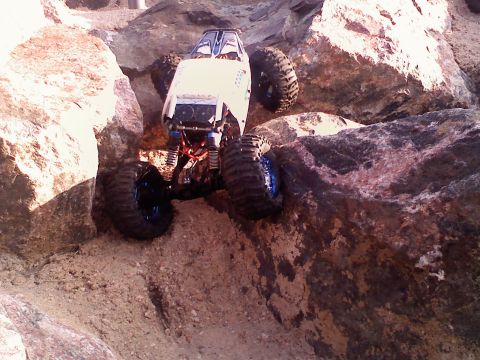 1996 Ford Bronco - A remote control rock crawler navigates a rocky terrain.