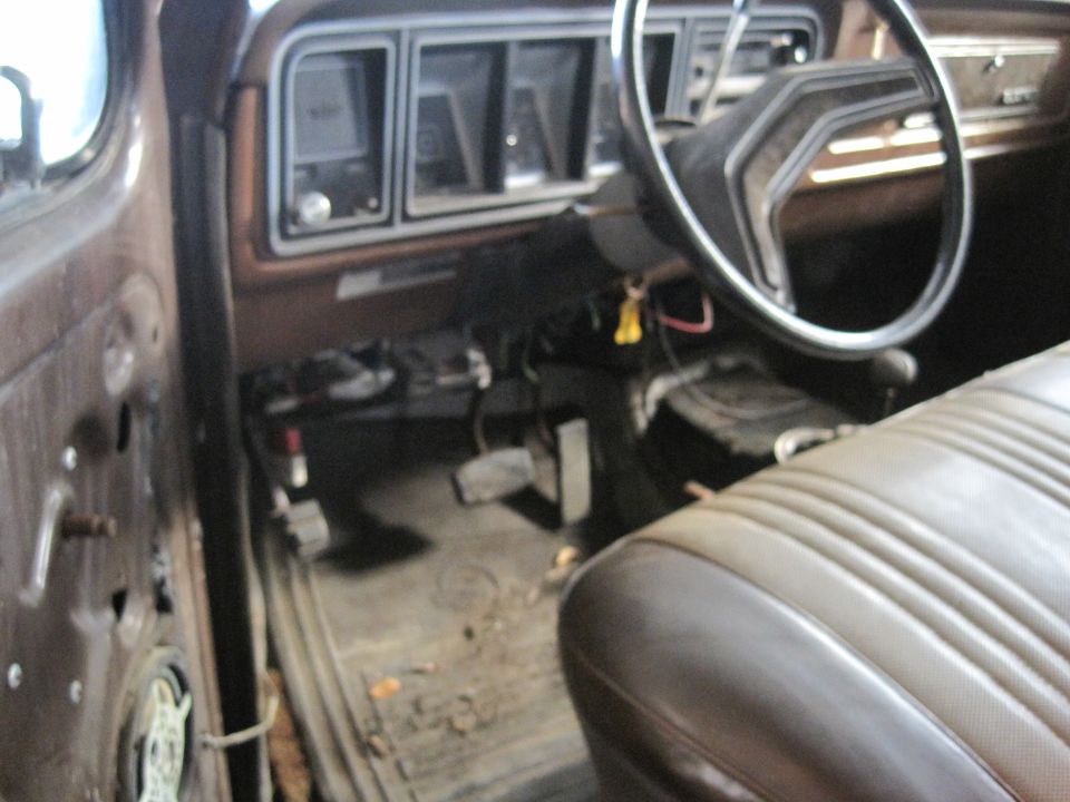 Interior view of a 1979 Ford Bronco showing dashboard and seats