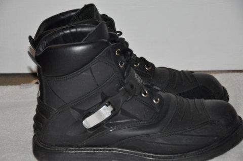 2008 Honda CBR-RR - Black motorcycle boots shown from the side, buckles and laces.
