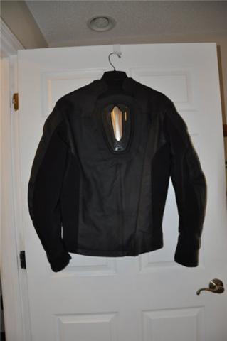 2008 Honda CBR-RR - This is a motorcycle jacket, not a 2008 Honda CBR-RR. The image shows the back of the jacket hanging on a door.