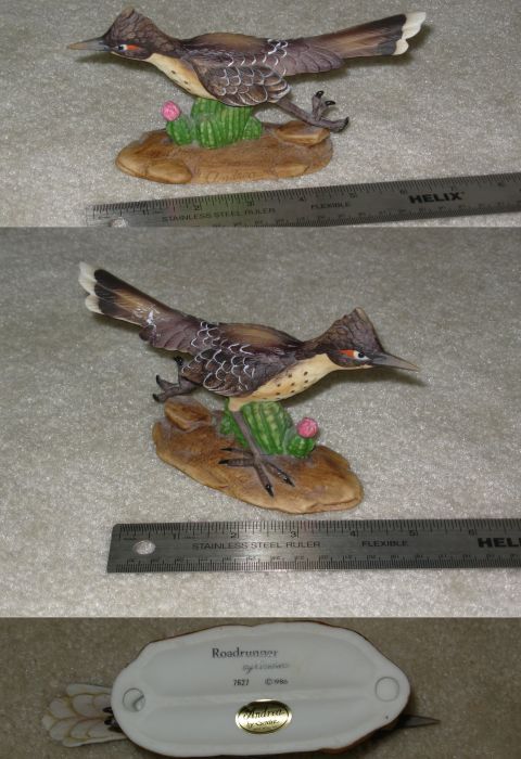 2004 Land Rover Land Rover - A ceramic roadrunner figurine is displayed with a ruler for scale, showing its detailed craftsmanship.
