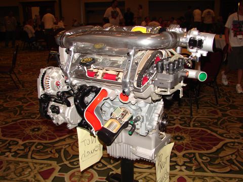 1992 Ford Taurus - A detailed cutaway engine display is shown, its internal workings and a prominent Supermotors.net watermark.