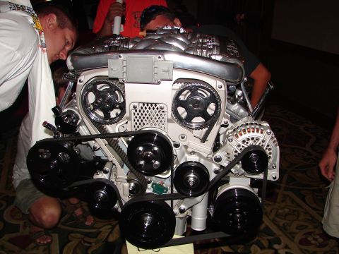 1992 Ford Taurus - Close-up view of a polished engine, likely on display at a convention.