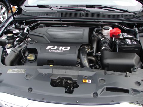 1992 Ford Taurus - Engine bay of a Ford Taurus SHO, showing the EcoBoost engine cover.