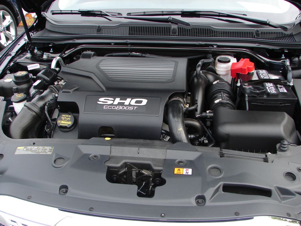 Ford Taurus SHO EcoBoost engine bay with engine cover visible
