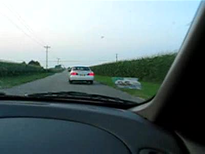 2002 Ford Taurus - Jim and I flying by Eric and Adam