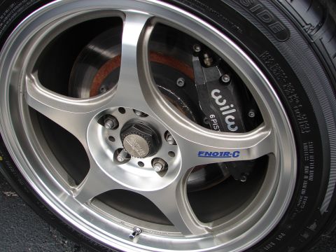 1992 Ford Taurus - Close-up of a wheel a Wilwood 6 PIST brake caliper and an FNO1R-C wheel.