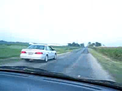 2002 Ford Taurus - Eric and Adam flying by Jim and I