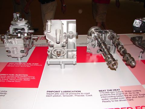 1992 Ford Taurus - Engine parts are displayed with informational text about their function and benefits.