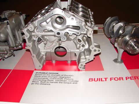 1992 Ford Taurus - A display shows a Ford Duratec engine block and crankshaft, highlighting its robust construction.