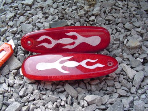 1999 Ford Taurus - Pair of custom red taillight lenses with flame graphics.