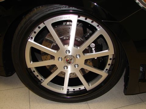 1992 Ford Taurus - This image focuses on the wheel and braking system of a vehicle, custom modifications.