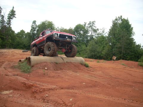 1979 Ford Bronco - A modified 1979 Ford Bronco navigates an off-road obstacle course.
