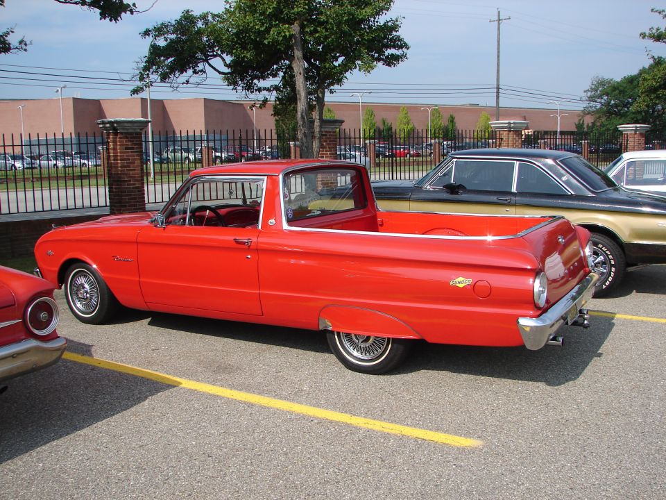 Red 1960 Ford Falcon Ranchero pickup truck parked, side view