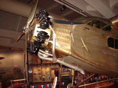 1992 Ford Taurus - A close-up view of an airplane's engine and fuselage, displaying the name 'FLOYD BENNETT'.