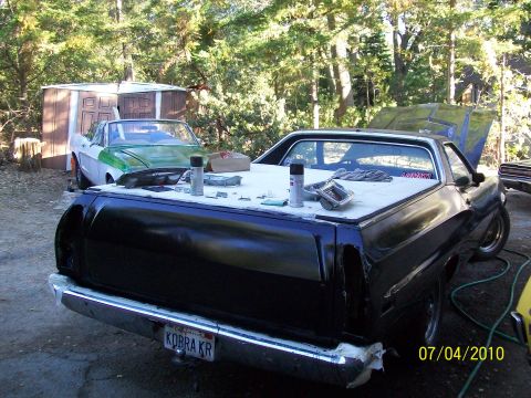 1972 Ford Ranchero - Tailgate after fender repair and six coats Of rust-Oleum Gloss black applied with a four inch foam roller mixed with mineral spirits and we…
