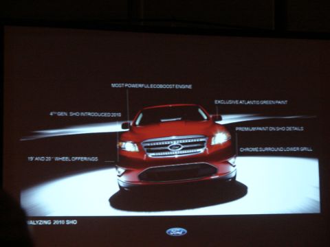 1992 Ford Taurus - A presentation slide displays a red Ford Taurus SHO, highlighting its features and introduction year.