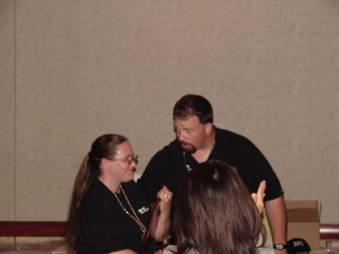 1992 Ford Taurus - Attendees interact at the 2010 SHO Convention, with the Supermotors logo in the corner.
