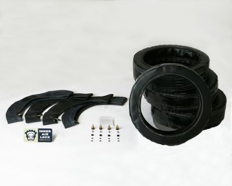 1989 Ford Bronco - Set of tire inner air locks and associated valve stems and inner tubes.