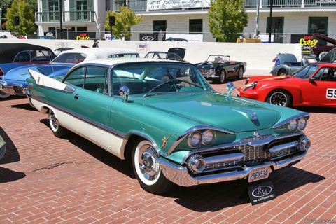 1991 Ford Crown Victoria - This classic 1959 Dodge Custom Royal coupe is displayed at an outdoor car show with other vehicles visible.