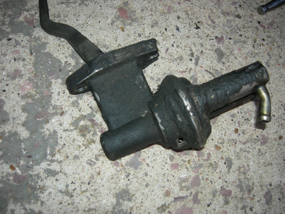 Used fuel pump with lever and hose barb
