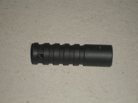 1989 Ford Bronco - This is a black cylindrical part with ridges and holes, likely a component from a vehicle.