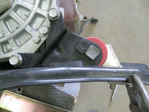 1994 Ford Probe - This image shows a close-up view of a vehicle's engine mount assembly.