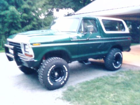 1979 Ford Bronco - This 1979 Ford Bronco features a two-tone paint scheme and aggressive off-road tires.